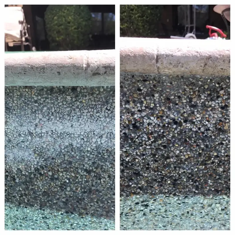 Pebble Tec wall at the waterline, dusted white with calcium and then showing its dark pebbles again